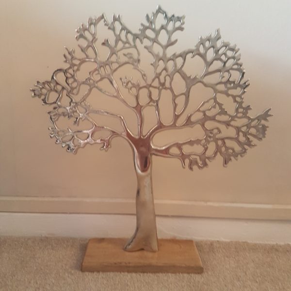 Distressed silver tree on a wooden base