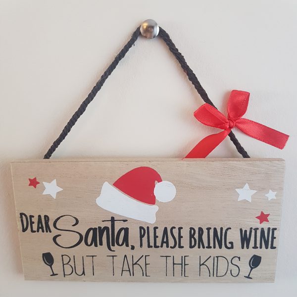 Wooden plaque sign with the text 'Dear Santa, Please bring wine, but take the kids'