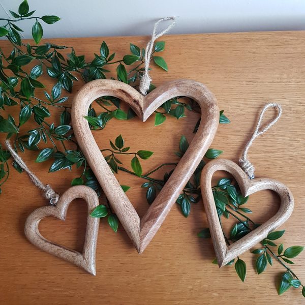 This real wood carved wooden heart would make a lovely addition  to your home.  Other sizes available.