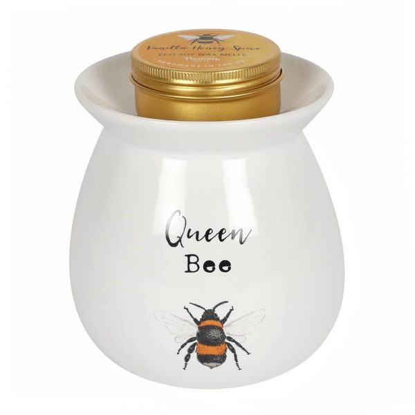 A gorgeous gift set for scenting the home, this item includes a large white ceramic oil burner with a floral 'Queen Bee' design and a tin of Vanilla Honey Spice fragranced soy wax melts which have been made in the UK.
