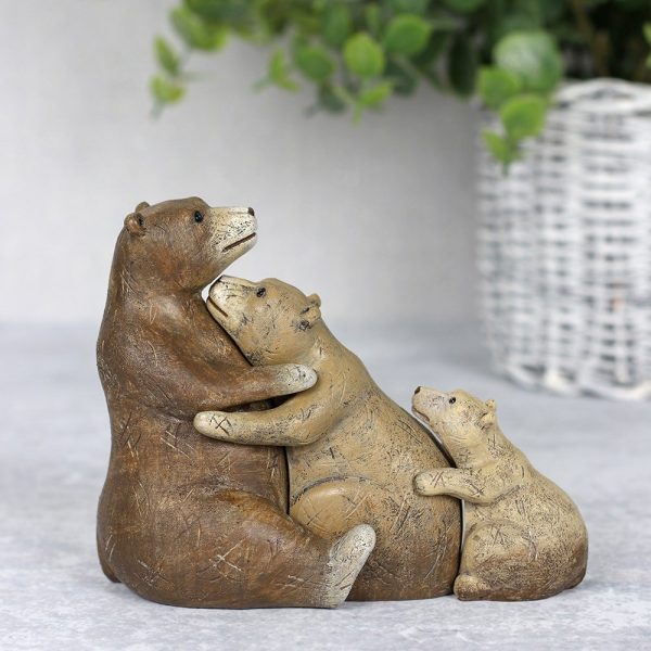 Bear family having a cuddle