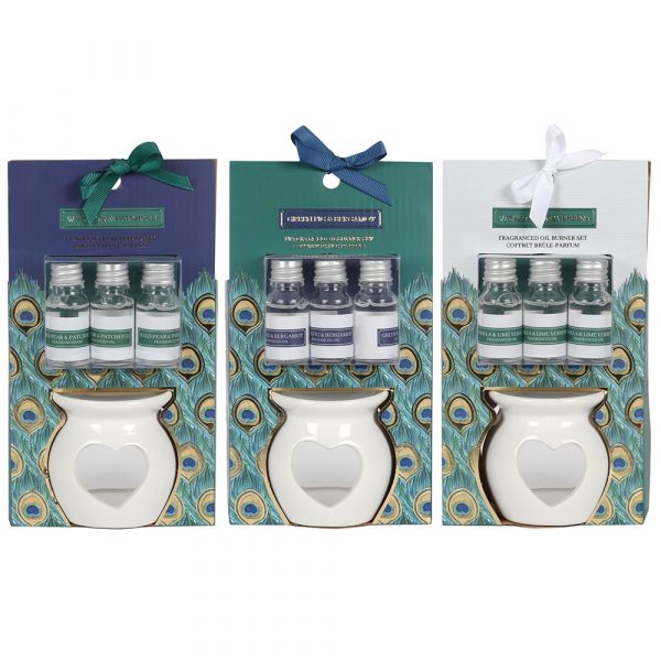 This oil burner gift set is inspired by peacock feathers and comes beautifully presented and ready for gifting. Set includes one ceramic oil burner with heart cut out and three bottles of fragrance oil. Scents include; Vanilla and Lime Verbena (white), Green Fig and Bergamot (teal) and Wild Pear and Patchouli (navy).