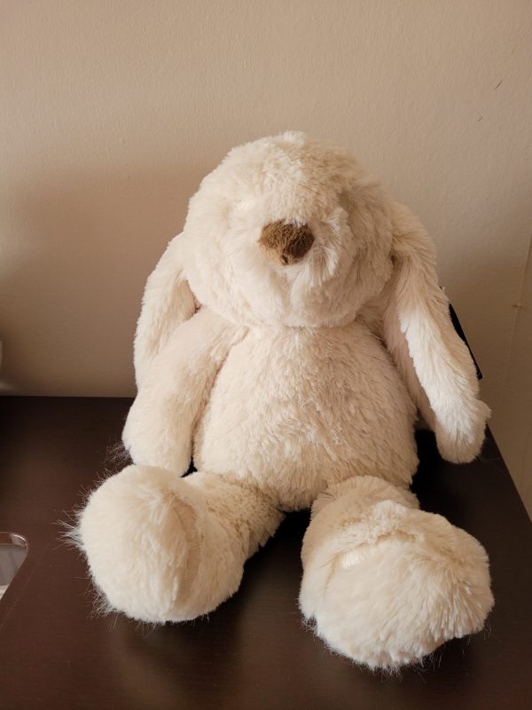 This super cute fluffy bunny doorstop would look perfect propping open any door in your home with its neutral cream colour
