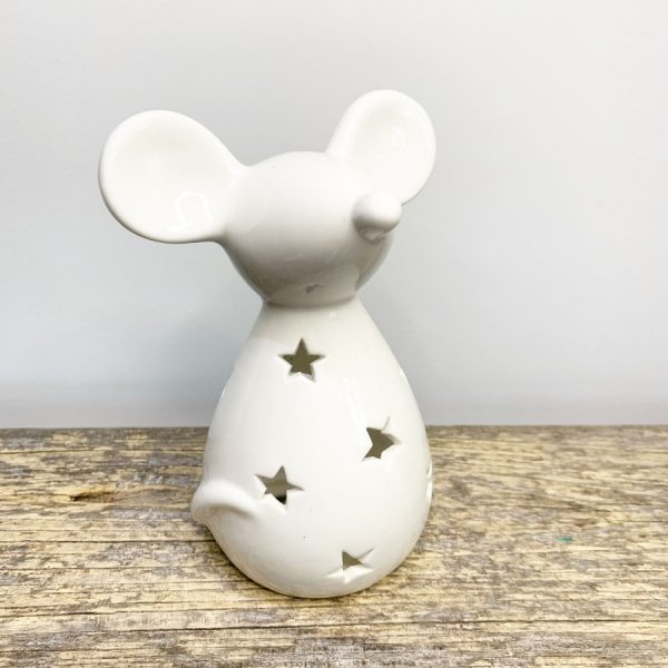 A charmingly simple ceramic mouse decoration with a sleek grey glaze and cut star decal  Place a tealight inside and watch the flickering flame project a charming starry shadow  A delightful little decoration to add to any home wanting a Cosy feature  Comes with LED T-Light and Batteries.