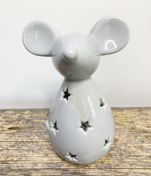 A charmingly simple ceramic mouse decoration with a sleek grey glaze and cut star decal  Place a tealight inside and watch the flickering flame project a charming starry shadow  A delightful little decoration to add to any home wanting a Cosy feature  Comes with LED T-Light and Batteries.
