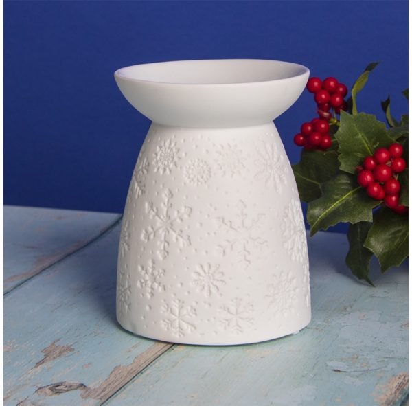 Perfect for projecting a cosy festive feel to your home at Christmas Time, a ceramic tealight holder with a snowflake embossed decal With its dipped dish on top, this tealight holder is perfect for melting waxes and burning oils in the home for a cosy aroma Dimensions :