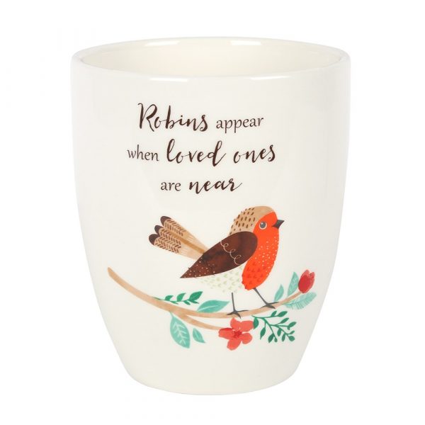 This ceramic plant pot is sure to bring a smile to someone's face with its cute robin illustration and sweet 'Robins appear when loved ones are near' text. Makes thoughtful gift for someone in need of some uplifting words.